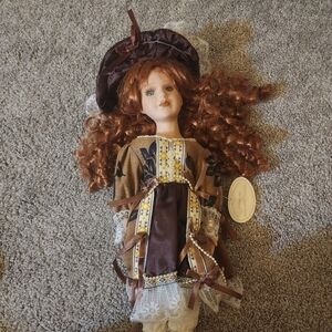 Beautiful porcelain doll from The Knightsbridge collection EUC